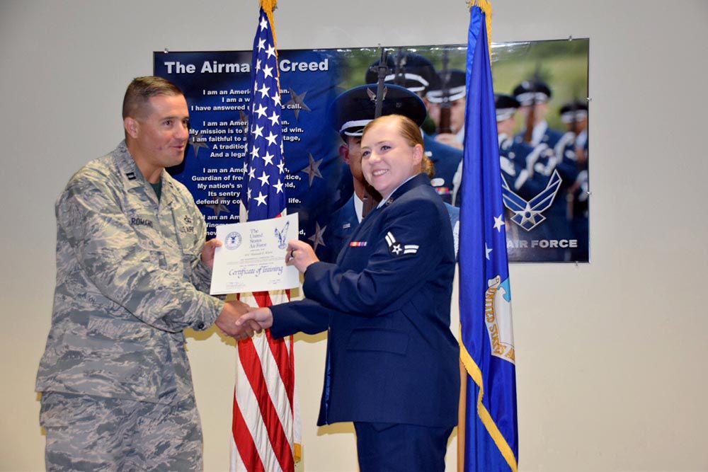 Reaching for the sky - Airman 1st Class Hannah E. Klein graduates from basic